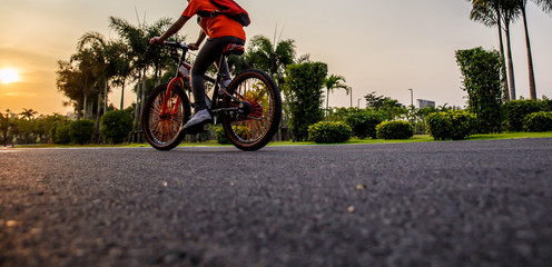 Man ride on bike on the road.