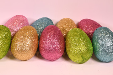 Two Rows of Glittering Easter Eggs Isolated