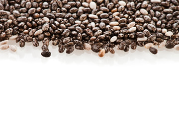 Border made of chia seeds isolated on a white background. Top view.