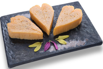 Sliced Japanese food tamagoyaki omelette sushi dinner meal isolated on white background