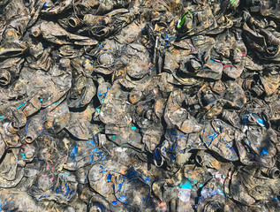 A pic of a dirty squashed bunch of plastic containers