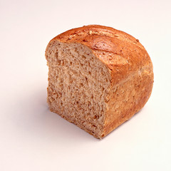 A shot of a freshly cut quarter loaf of bread