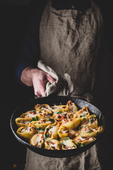 Skillet of pasta stuffed with ground beef, spinach and cheese