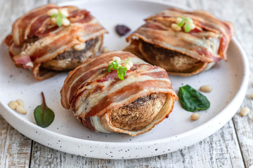 Baked mushrooms stuffed with cheese and pine nuts