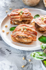 Baked mushrooms stuffed with cheese and pine nuts