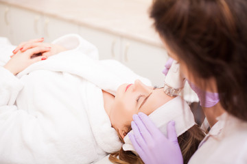 Obraz na płótnie Canvas Woman getting LPG hardware massage at the beauty clinic