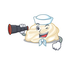 A picture of whipped cream working as a Sailor with binocular