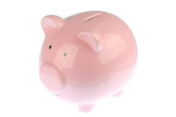 Pink piggy bank isolated on white background