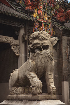 Fu dogs in ancient temple. Chinese culture, art in the roof. Asian architecture. Exotic Tavel and Destination © Jonathan