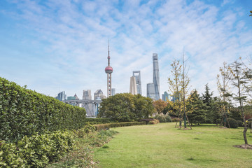 Fototapeta na wymiar the park and skyline of shanghai in china.