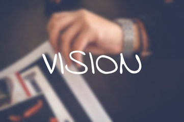 Vision word with business blurring background