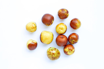 Chinese jujubes on white background.