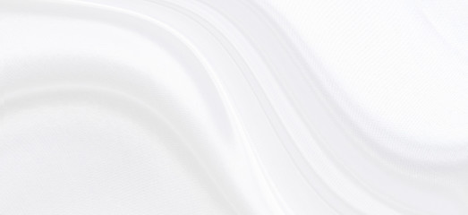 White gray satin texture that is white silver fabric silk panorama background with beautiful soft...