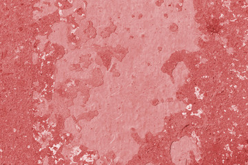 Old asphalt surface close up. Abstract background red color toned