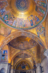 Fototapeta na wymiar Venice, Italy - CIRCA 2013: Mosaic art at the ceiling of St Mark Cathedral (Basilica di San Marco).