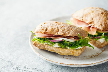 Sandwiches with Ham and vegetables. Selective focus.