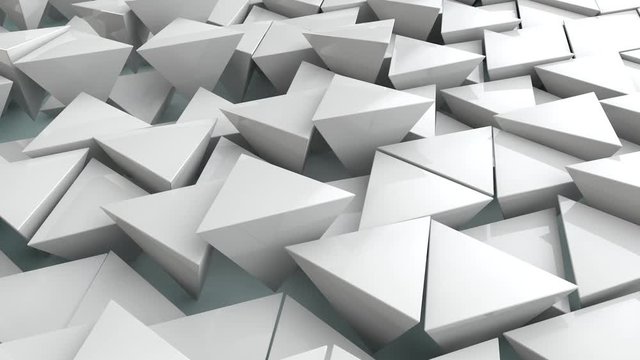 3D animation of an abstract background of many white pyramids, geometric shapes arranged randomly in space. Camera movement is cyclical, uniform, with the possibility of endless, seamless animation.