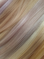 Obraz premium A palette of shades of dyes for blonde hair in a beauty salon.