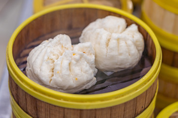 Chinese steamed dumpling in dimsum traditional bamboo container 