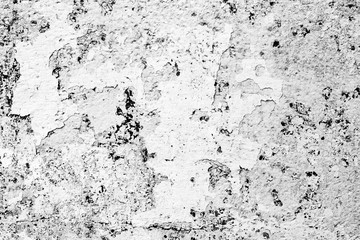 Texture of a concrete wall with cracks and scratches which can be used as a background