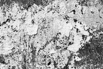 Texture of a concrete wall with cracks and scratches which can be used as a background