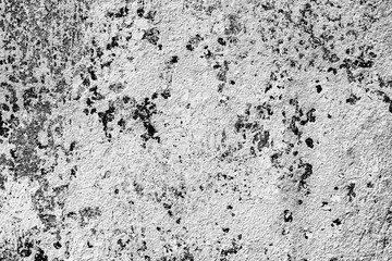 Texture of a concrete wall with cracks and scratches which can be used as a background
