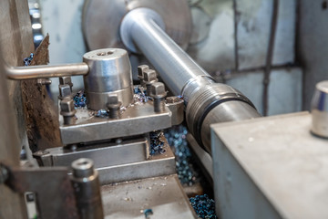 metal turning, close-up, wood shavings, close-up lathe