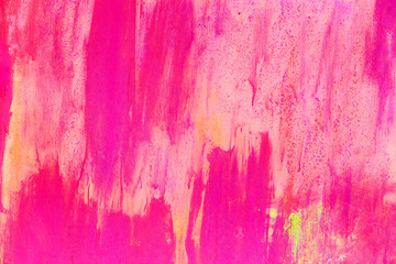 Texture of iron metal painted multicolored pink blue yellow peeling paint of old battered scratched...