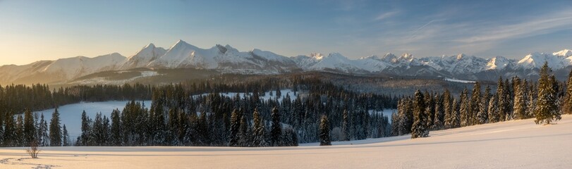 winter panorama of the mountains in the light of the rising sun - Tatra Mountains, Poland