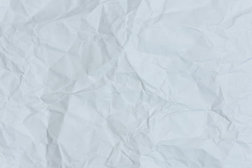 White crumpled paper texture background.