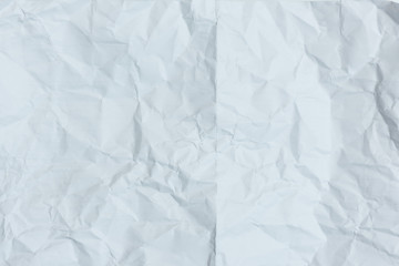 Obraz premium White crumpled paper texture background.