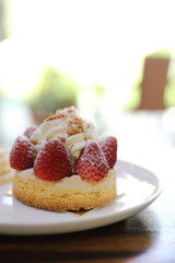 Strawberry cake sweet dessert on wood background