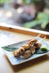 japanese food , Chicken yakitori on wood background