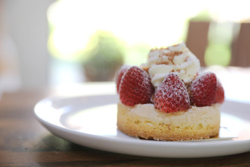 Strawberry cake sweet dessert on wood background