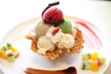 ice cream on waffle and fruit topping