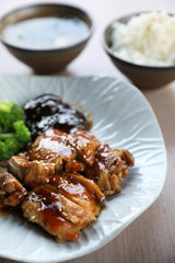 japanese food , Chicken teriyoki with rice on wood background