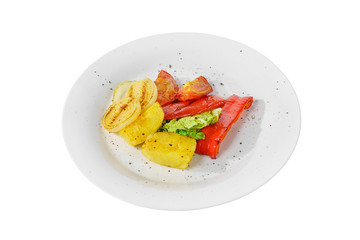 Vegetables grilled portion of side dish on a plate on white isolated background, Side view. Appetizing dish for the menu restaurant, bar, cafe