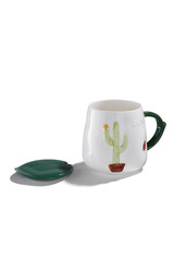 Subject shot of a white ceramic mug with a picture of a flowered cactus in a pot and a ladybird. The cute cup with a figured handle and a green leaf-formed cover are isolated on the white background. 