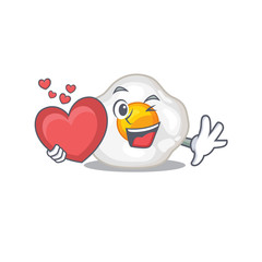 Romantic fried egg cartoon picture holding a heart