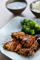 japanese food , Chicken teriyoki with rice on wood background