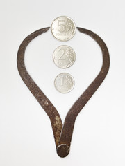 Vintage caliper isolated over white background. coin in the dividers.  Symbol of bad economy