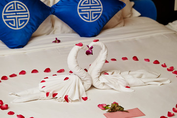 Bedroom decoration, decorated with towel and flower 