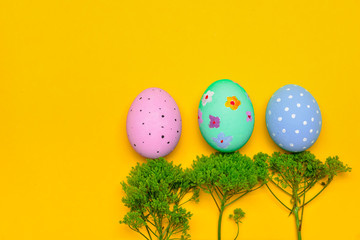 Beautiful Easter eggs on color background