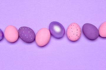 Beautiful Easter eggs on color background