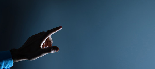 business man presses on touch screen