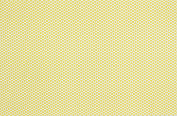 creative hole net grate on yellow background