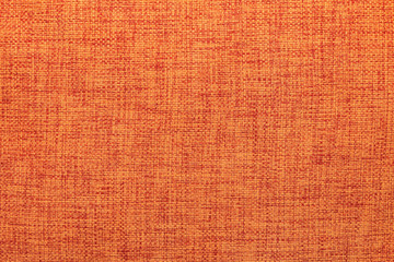 Flat lay closeup orange grid fabric. Abstract trendy modern texture background