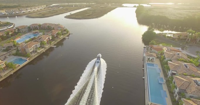 Drone view of a yacht in the Hiterote canals, Venezuela, during the golden hour