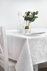  the dining table is served. in bright colors.