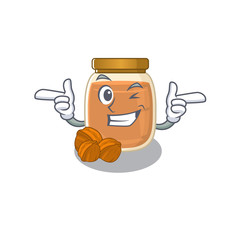 Cute mascot cartoon design of walnut butter with Wink eye